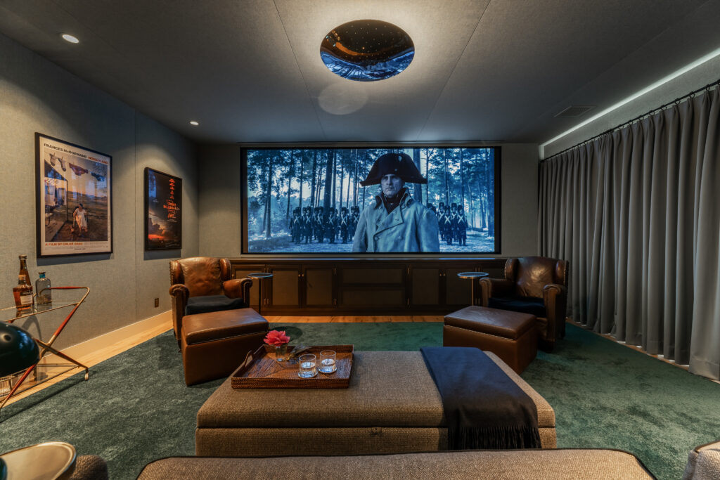 DCI-compliant video wall in luxury home cinema, showcasing vibrant, high-resolution visuals.